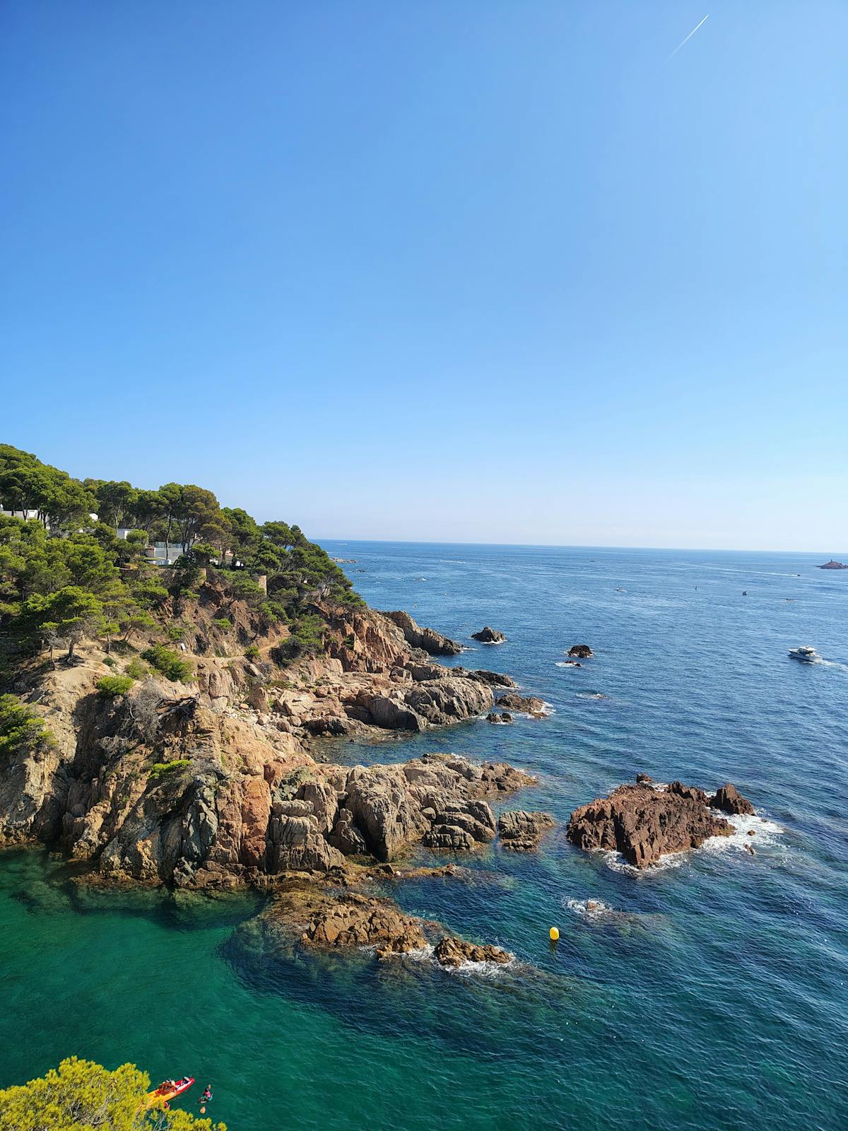 Rocky island coastline with crystal clear Mediterranean water