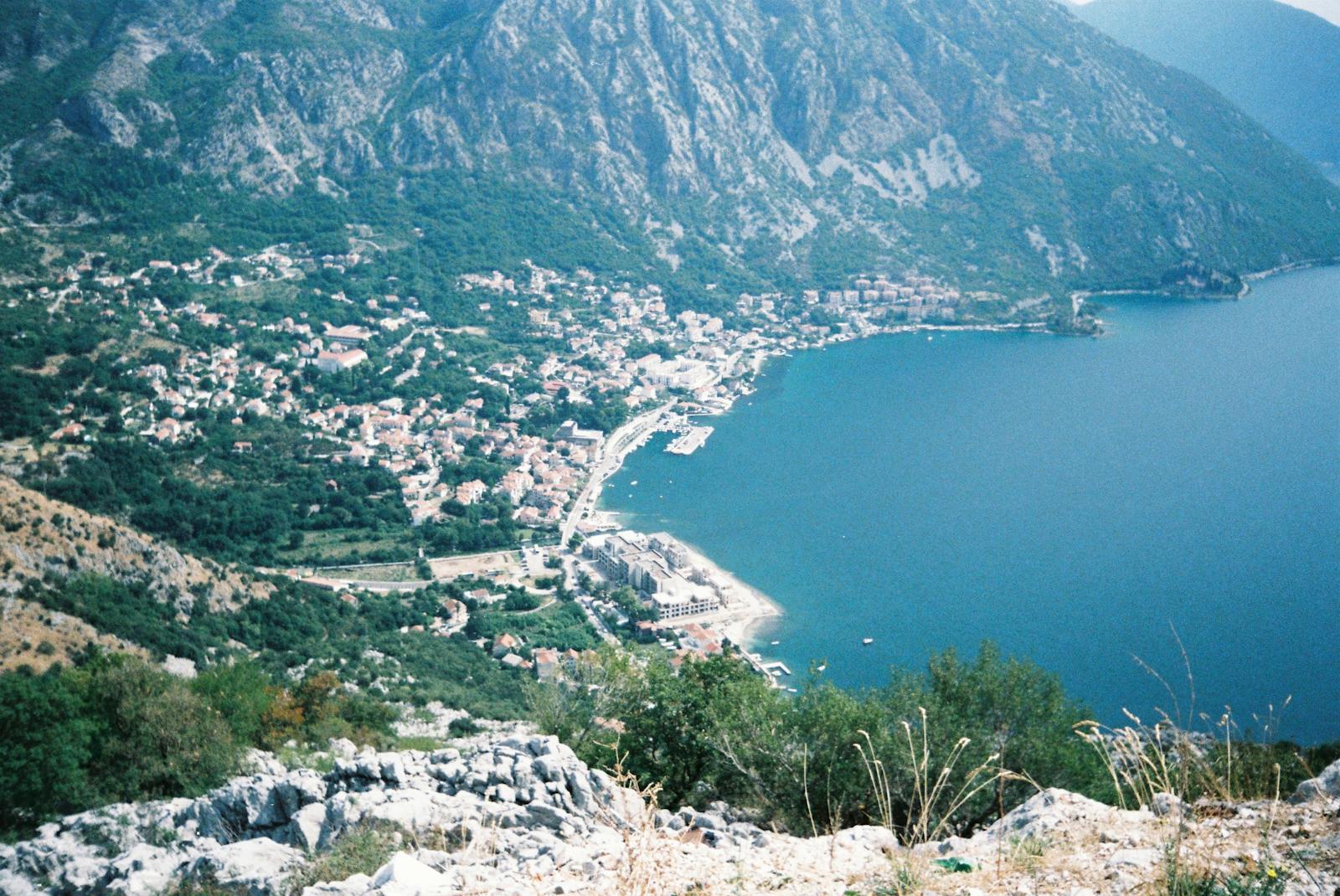 Bay of Kotor with sailing yacht and mountains