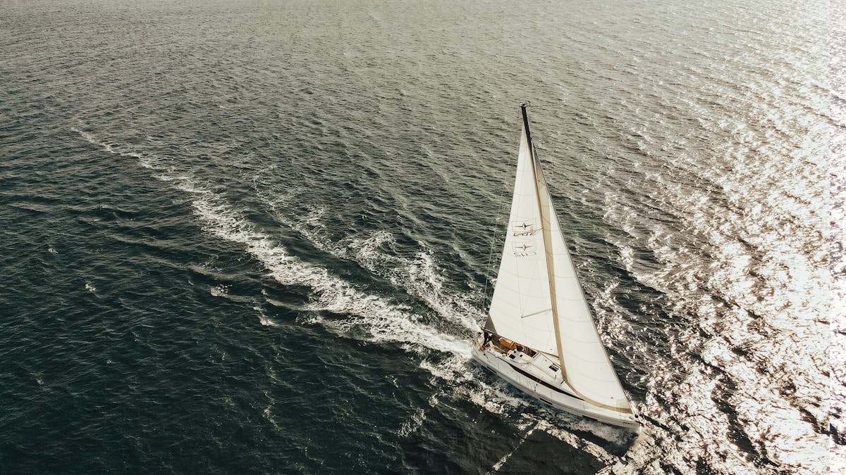 A sailboat cutting through the Mediterranean sea