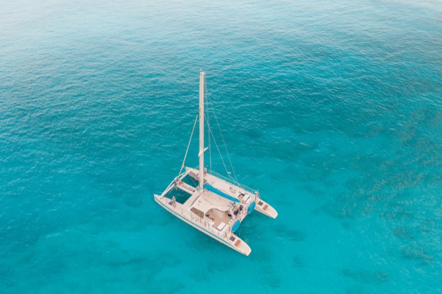 Sailing yacht at anchor in Formentera turquoise water