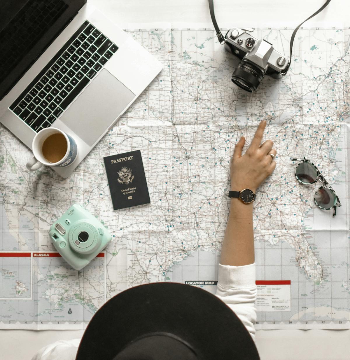 Person planning travel with a laptop