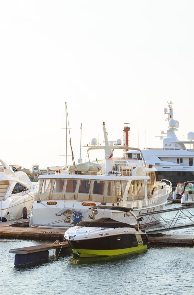 Marina with sailing yachts and clear water