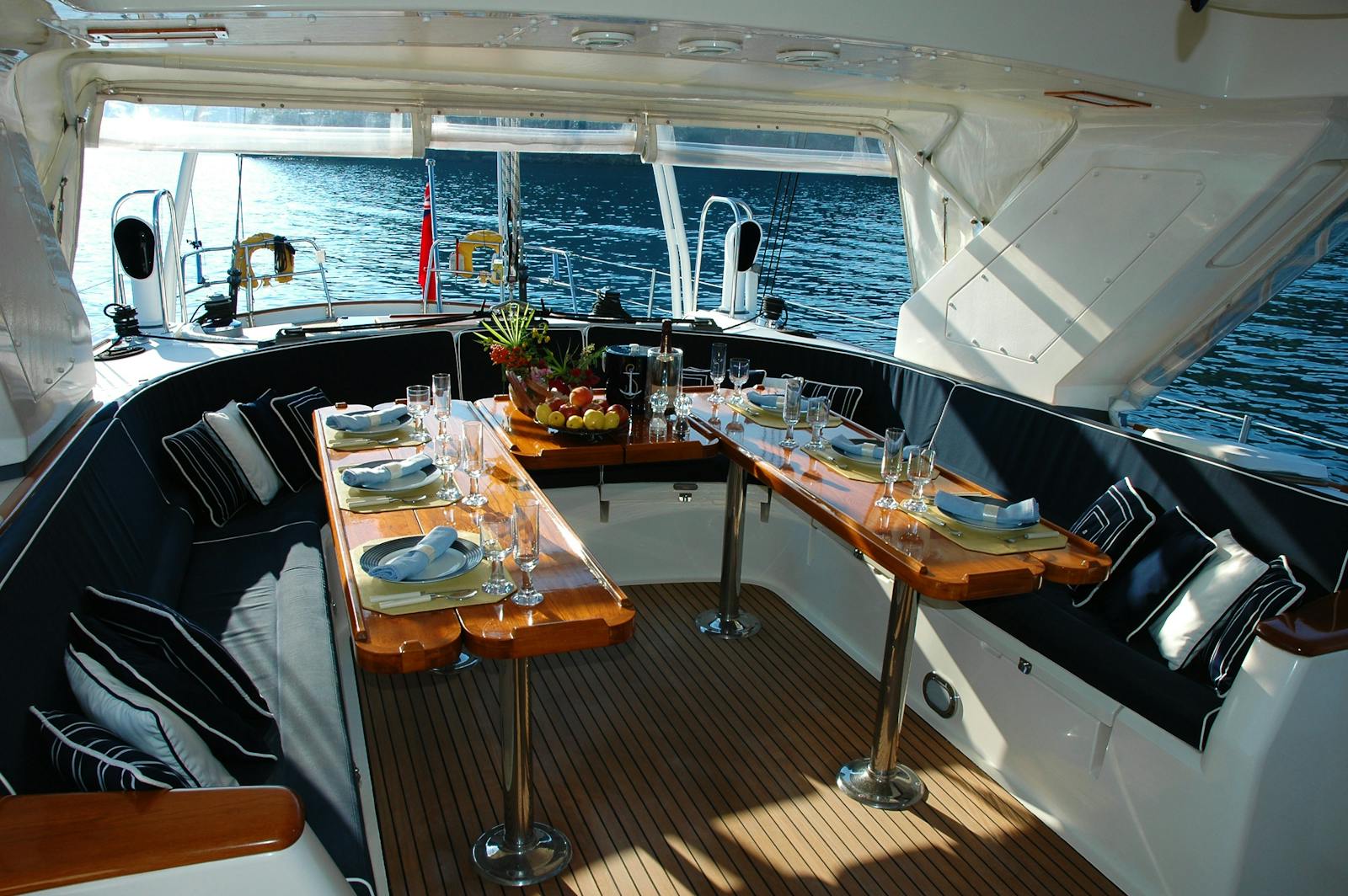 Yacht dining table set for guests on deck